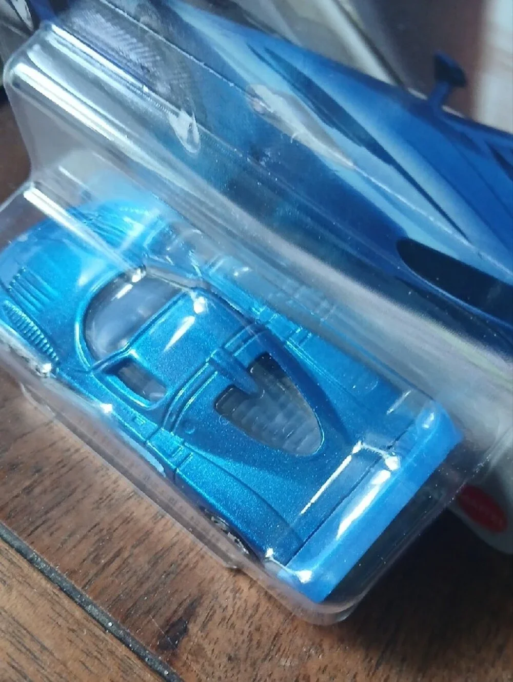 Match blue Maserati MC12 die-cast sports car